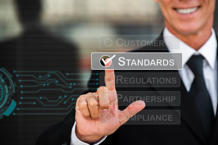A man pointong on standard quality of sercurity