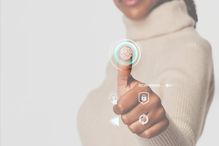 woman scanning fingerprint with futuristic interface for zero trust security solutions